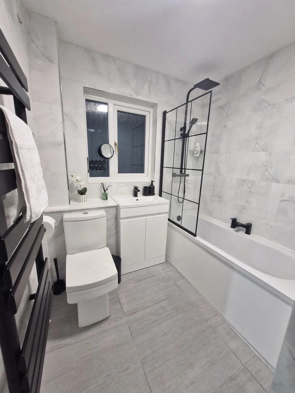 Bathroom basin, mirror and bath